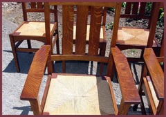 Close up image of the arm chair, displaying the excellent quarter sawn grain in the arms.